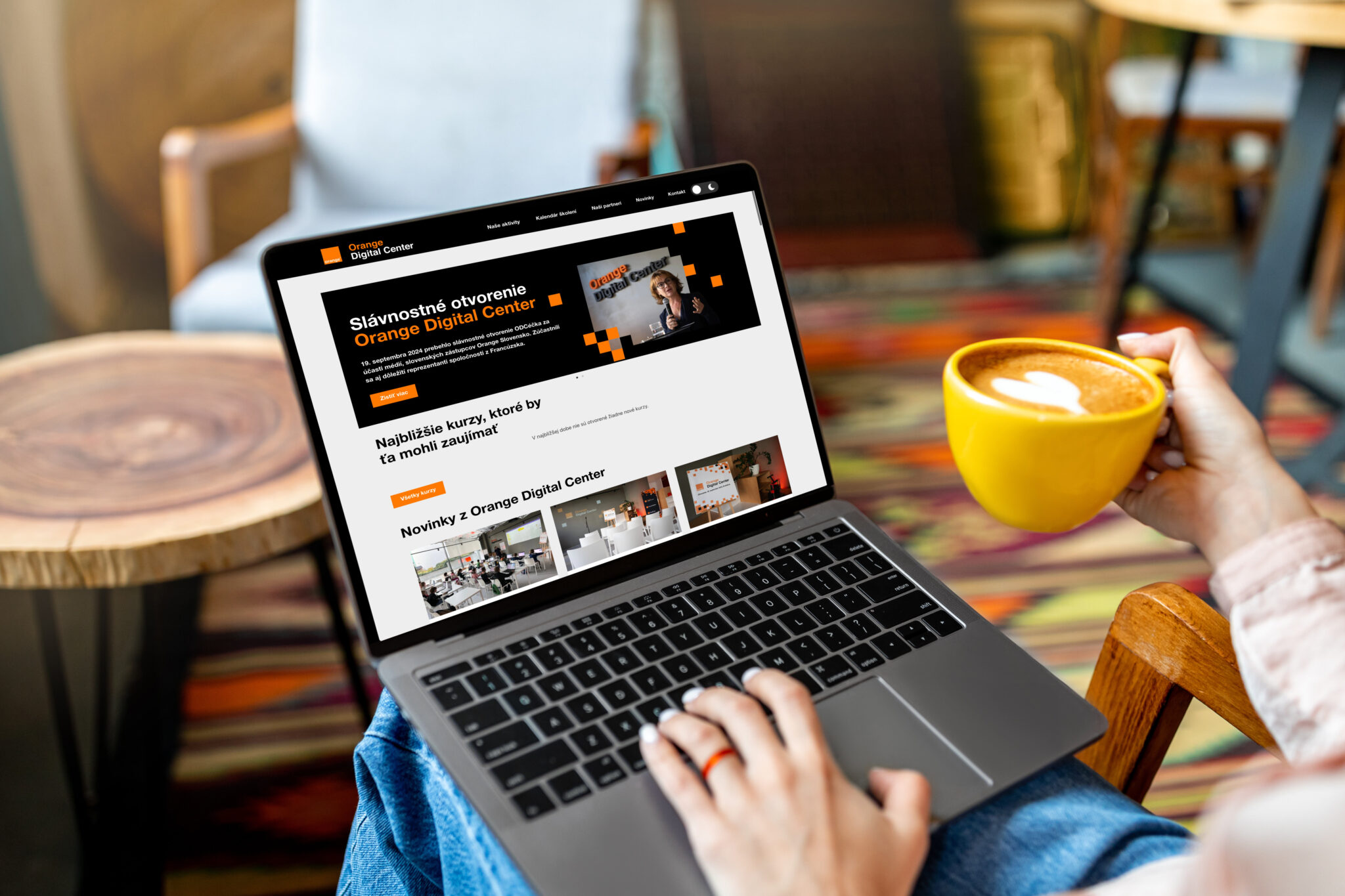 lady using laptop with fashion store on screen, buying underwear, sitting in cafe, surfing internet and drinking coffee